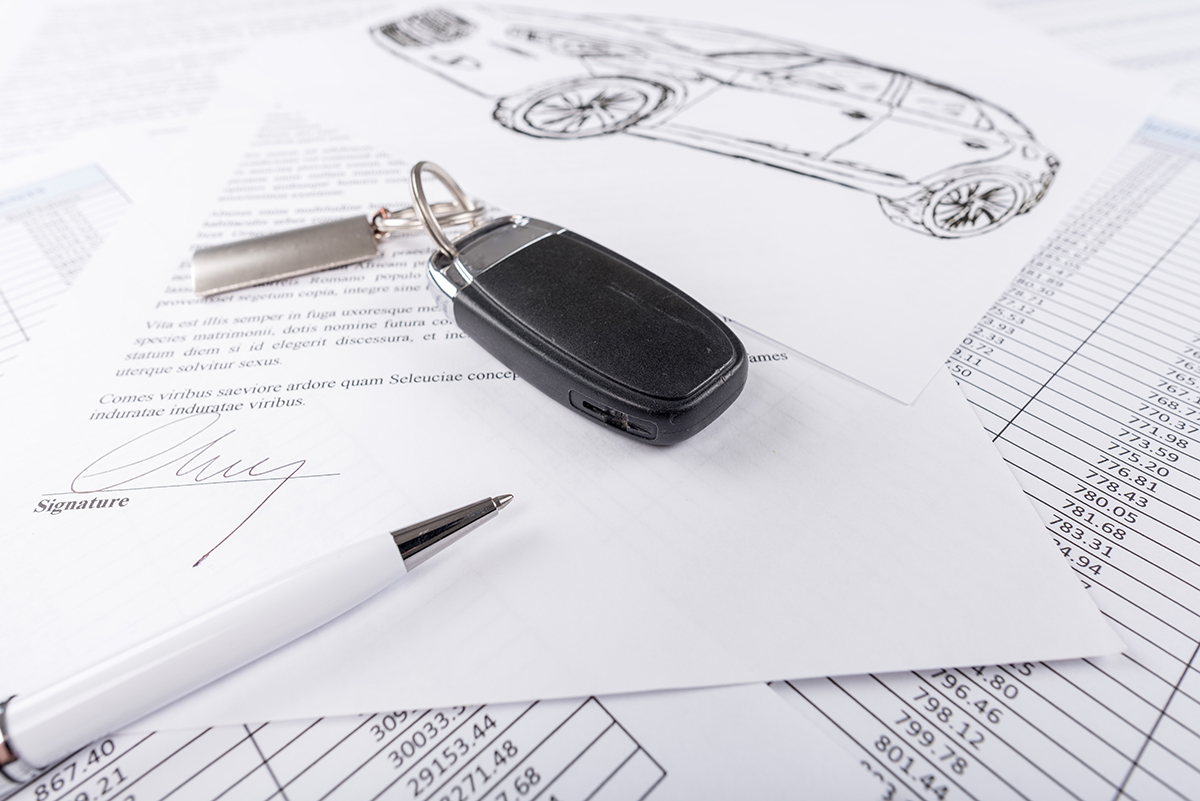 photo of paperwork and car keys