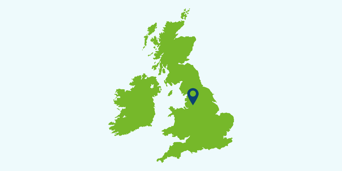 Map of UK with blue marker showing Manchester