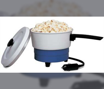 Popcorn in a machine which has a power cord to plug into a car