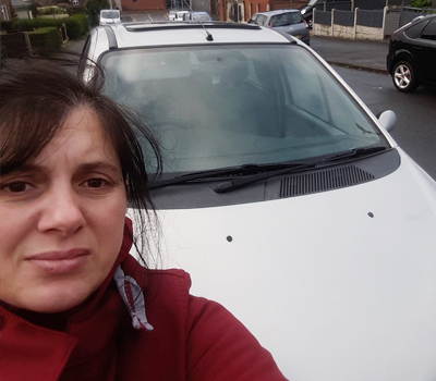 Selfie of a customer with her car