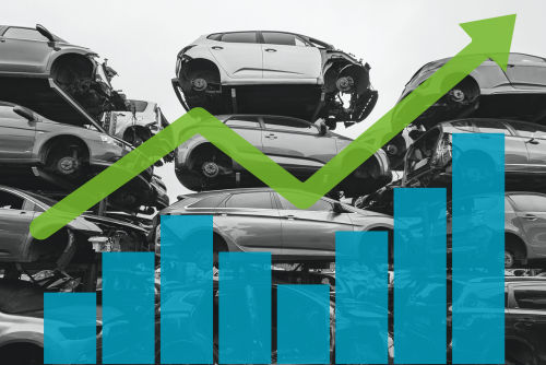 Black and white photo of stacked scrap cars, with a graphic overlay of a blue chart and a green arrow